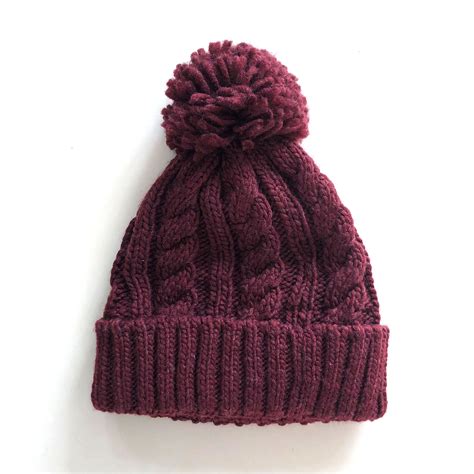 Nov 16, 2019 · below you'll find 16 free knit hat patterns on circular needles, and they offer hat patterns that will fit people of all ages. Fleece Lined Thick Cable Knit Bobble Hat in 2021 | Bobble ...