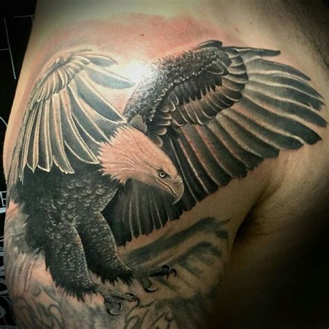 Eagle By Jesse Goetschius Gradeatattoos Eagle Tattoos Eagle Tattoo Bull Tattoos
