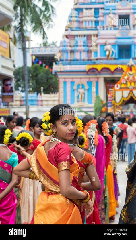 Indian Girls In Traditional Dress Dancing At A Festival In The Streets