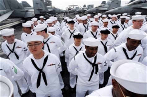 Us Navy Sailors Muster On The Flight Deck