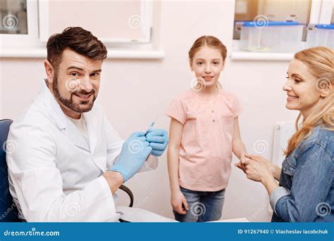 Positive Delighted Doctor Smiling On Camera Stock Photo Image Of