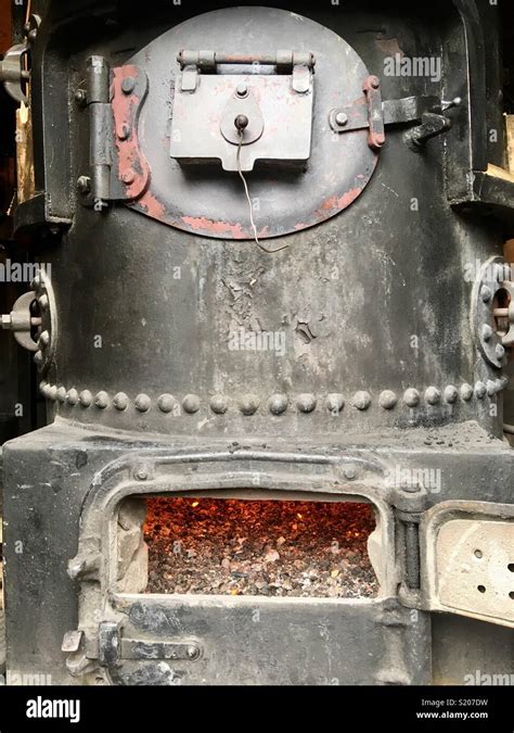 Old Boiler With Furnace Door Open Stock Photo Alamy