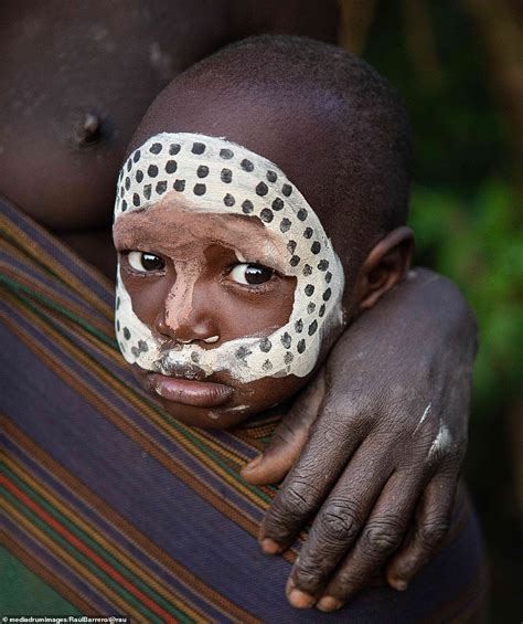 Stunning Images Show Suri Tribeswomen Who Slice Their Lips Aged 12 To