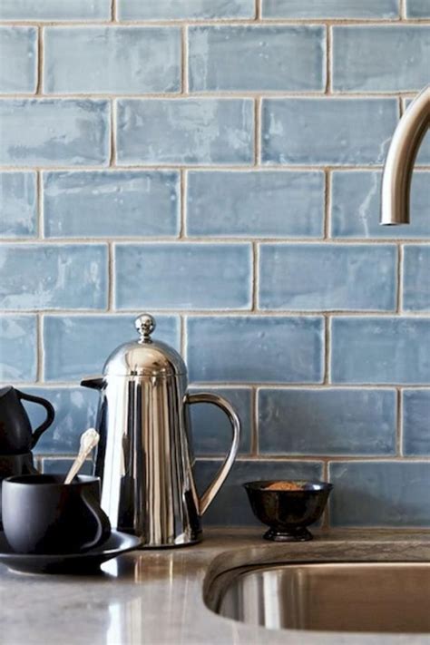 Coordinating with this granite, the backsplash features white subway tile on a staggered pattern with a grey grout color. 40+ Simple & Beautiful Kitchen Backsplash Design Ideas on ...