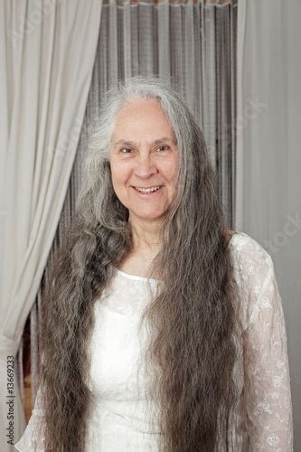 Elderly Person With Long Hair Stock Photo And Royalty Free Images On