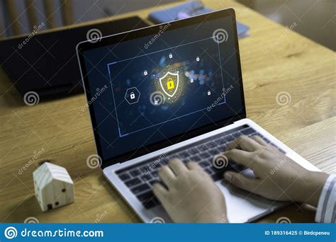 Person Using A Laptop Computer With Data Protection Cyber Security