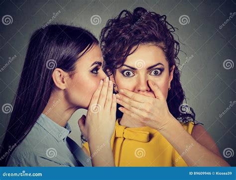 Shocked Woman Listening Gossip A Secret In The Ear Stock Photo Image