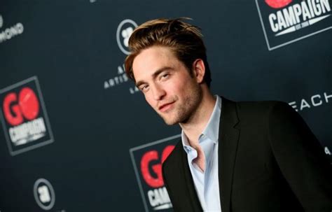 Robert Pattinson Shoots Himself For The Cover Of Gq