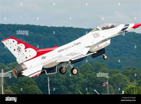 Closeup Of A Us Airforce Thunderbirds F16 Fighter Jet Taking Off Stock