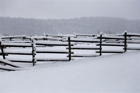 Fresh Snow Filled Corral Fences At Rural Winter Snowy Horse Farm Stock