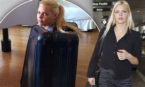 Sophie Monk Climbs Into Her Luggage As She Enjoys A Break In Los