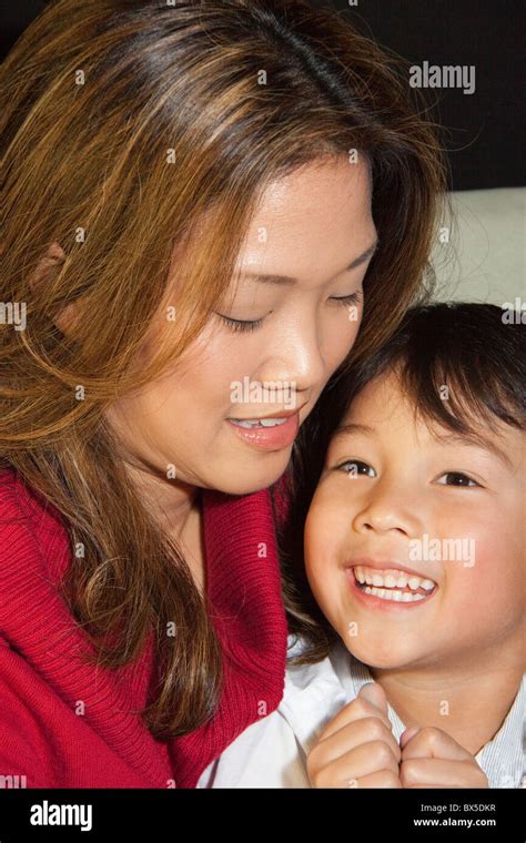 Japanese Mother And Son Hugging Stock Photo Alamy