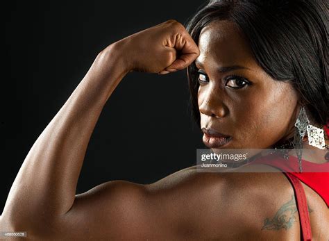 Beautiful Woman Flexing High Res Stock Photo Getty Images