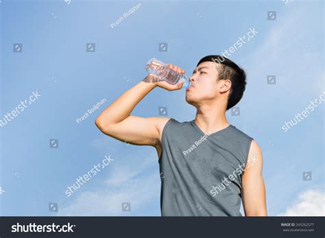 Thirsty Athlete Drinking Water After Workout Stock Photo 245262577