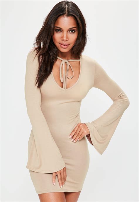 Lyst Missguided Nude Flare Sleeve Bodycon Mini Dress In Natural