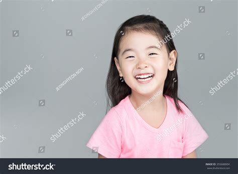 Happy Asian Girl Smile On Her Foto Stok 355688804 Shutterstock