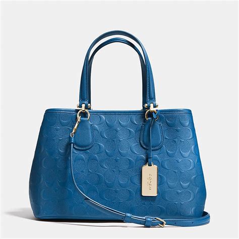 SMALL KITT CARRYALL IN LOGO EMBOSSED LEATHER | Embossed leather, Womens ...