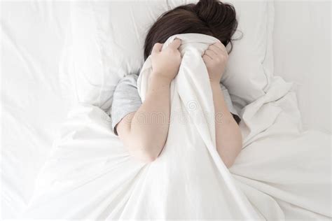 Scared Woman Hiding Her Face Under The Sheet Stock Image Image Of