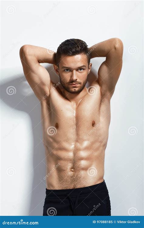Portrait Of A Muscular Shirtless Man Posing In Studio Stock Image