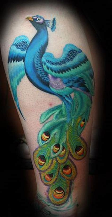 Been tattoo mannen kalf tattoo viking tatoeages. Green adorable peacock tattoo on leg - | TattooMagz ...
