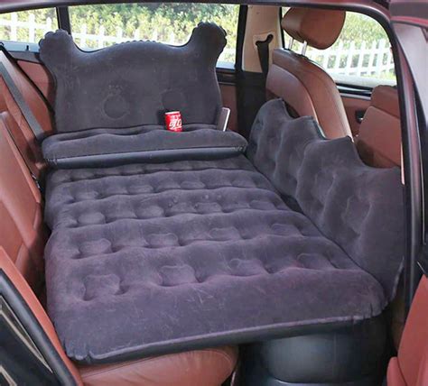 this inflatable backseat lounger and bed for the car is perfect for long road trips