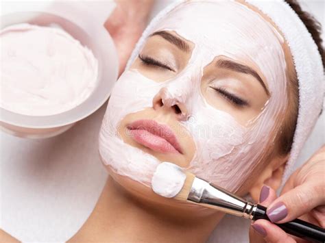 Woman Receiving Facial Mask In Spa Beauty Salon Stock Image Image Of Care White 188606949