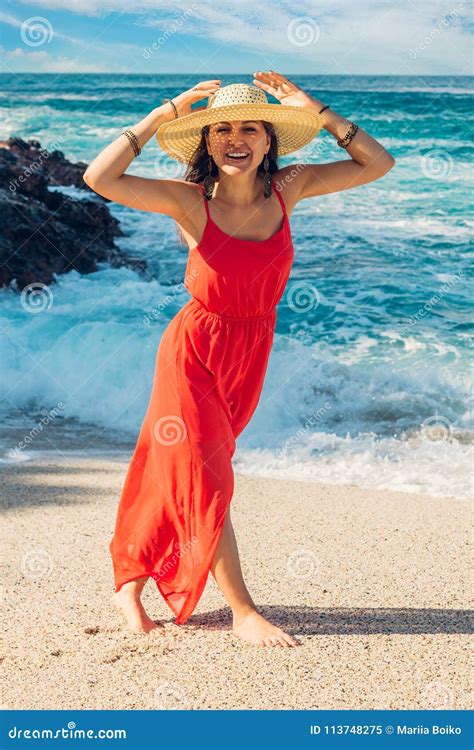 Beautiful Woman Enjoys The View Of Waves On Sunny Beach Happy Woman