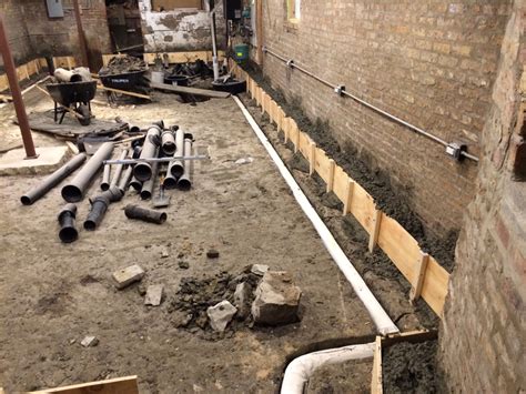Basement Retaining Wall And Footing Curb Two Flat Remade