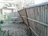 Images of Fix Leaning Wood Fence