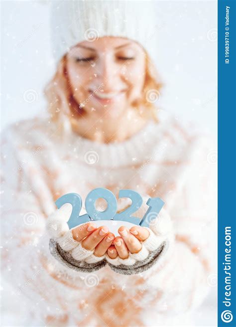 Cute Woman Holds 2021 In Her Hands Merry Christmas And A Happy New