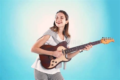 Young Woman Playing Electric Guitar Stock Photo Image Of Hobby Color