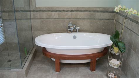 bath remodel featuring schon free standing tub rose construction inc