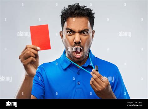 Angry Indian Referee With Whistle Showing Red Card Stock Photo Alamy