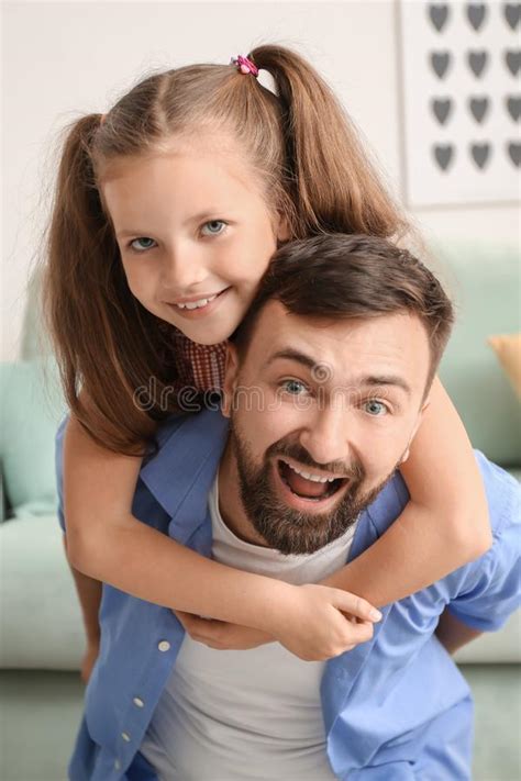 Portrait Of Smiling Father And Daughter At Home Stock Image Image Of