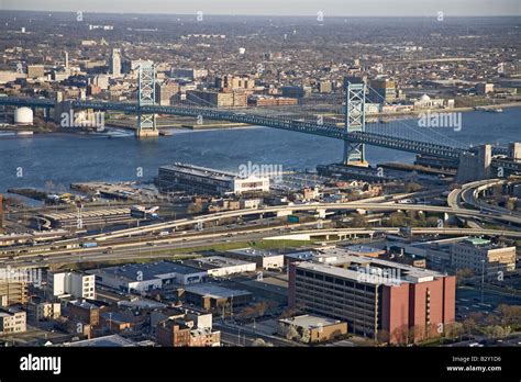 Aerial View Of Ben Franklin Bridge Crossing The Delaware River From