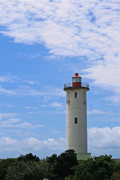Free Images Sea Coast Ocean Cloud Lighthouse Sky White Bush
