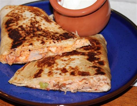 Cut chicken breasts into small bite size pieces. Chicken Quesadillas Recipe - Genius Kitchen