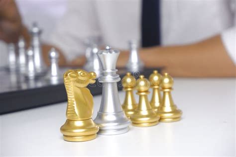 Businessman Playing Chess Game For Business Strategy Leadership And