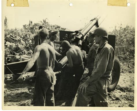 If you know anyone with. 105mm crew loads a shell into the breech during attack on Kwajalein in January 1944 | The ...