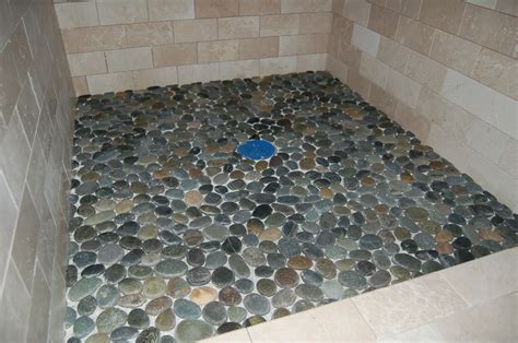 Each piece of the mosaic features a unique rock look with a honed finish perfect for shower floors. Decoration: Appealing Pebblestone Flooring With Stunning ...