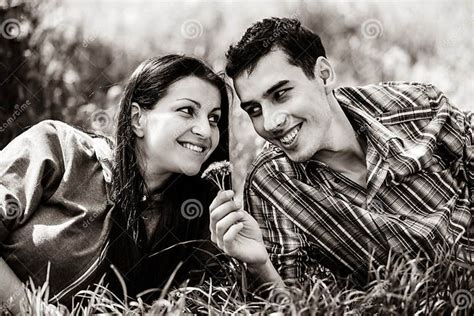 Copule Of Man And Woman On Grass In A Park Stock Photo Image Of