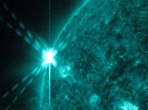 Nasa Emerging Sunspot Releases Mid Level Solar Flare