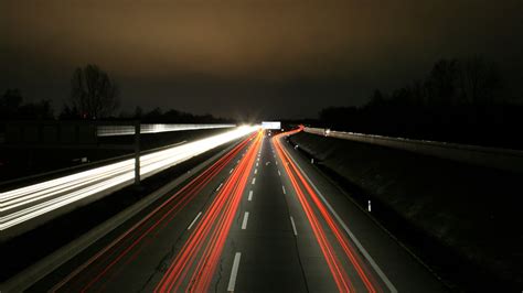 Time Lapse Photograph Of Highway During Nighttime Hd Wallpaper