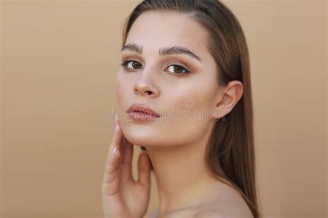 Beautiful Young Woman With Clean Fresh Skin Touching Own Face Facial