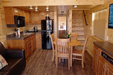Bedroom has abundant cabinet/drawer space while the second bathroom has a sliding door bath/shower. Creekside Cabins Series | Cavco Park Models & Cabins ...