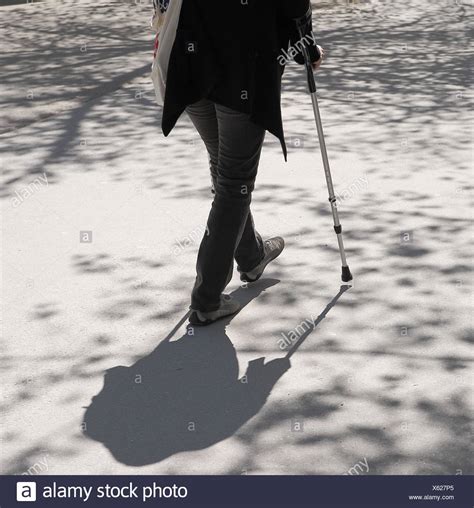 Walking With Crutches Stock Photos And Walking With Crutches Stock Images