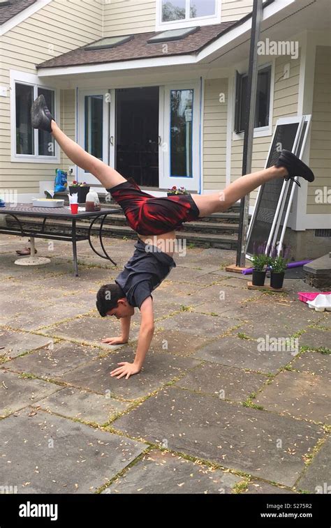 A Boy Doing A Handstand Stock Photo Alamy