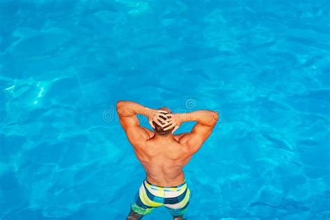 Guy In Blue Water On The Beach Male Model In Swimwear Stockfoto Bild