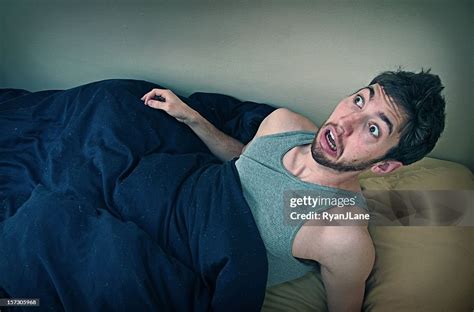 Young Man Wakes Up From Bad Dream High Res Stock Photo Getty Images