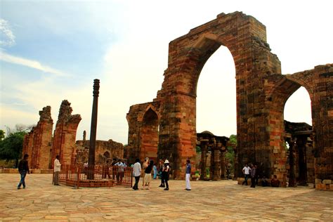 Towering Qutub Minar Amid The Ruins Of Ancient Civilization India